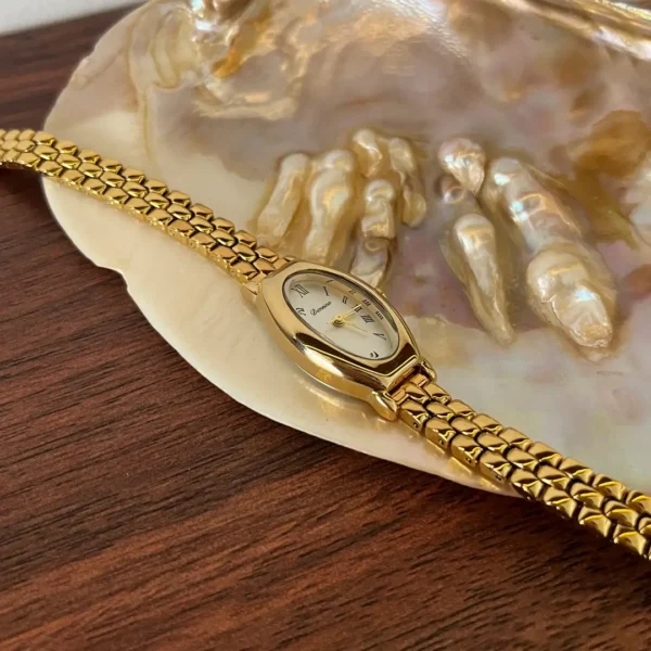 Classic Irregular-Shaped Gold Dial Bracelet Watch for Women