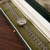 Elegant Silver Leaf Link Bracelet Round Dial Watch for Women