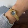 Elegant Blue Round Dial Gold Woven Bracelet Watch for Women