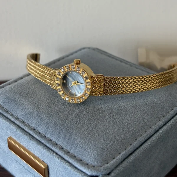Elegant Blue Round Dial Gold Woven Bracelet Watch for Women