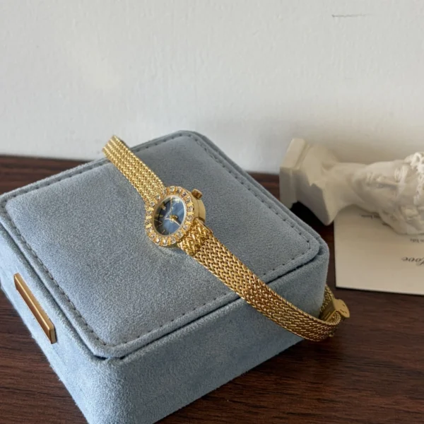 Elegant Blue Round Dial Gold Woven Bracelet Watch for Women