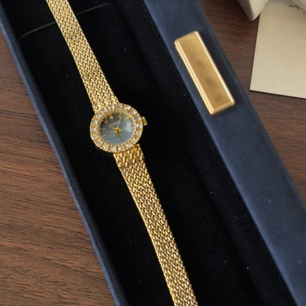 Elegant Blue Round Dial Gold Woven Bracelet Watch for Women