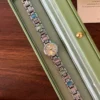 Classic Multicolor Accent Round Dial Silver Bracelet Watch for Women