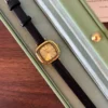 Classic Gold Rounded Square Dial Black Strap Watch for Women