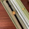 Minimalist Gold Round Dial Slim Black Strap Watch for Women