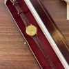 Classic Gold Round Dial Textured Brown Strap Watch for Women