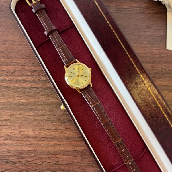 Classic Gold Round Dial Textured Brown Strap Watch for Women