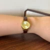 Classic Gold Round Dial Textured Brown Strap Watch for Women