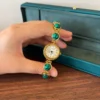 Elegant Green Round Accent Gold Bracelet Watch for Women
