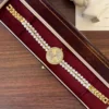 Elegant Cream Round Dial White Bead Gold Bracelet Watch for Women