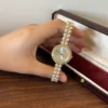 Elegant Cream Round Dial White Bead Gold Bracelet Watch for Women