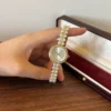 Elegant Cream Round Dial White Bead Gold Bracelet Watch for Women
