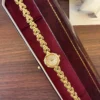 Classic Cream Round Dial Gold Curved Link Bracelet Watch for Women
