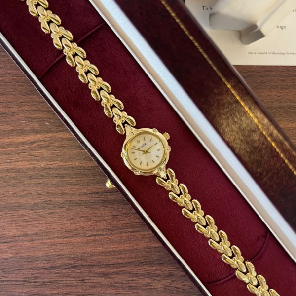 Classic Cream Round Dial Gold Curved Link Bracelet Watch for Women