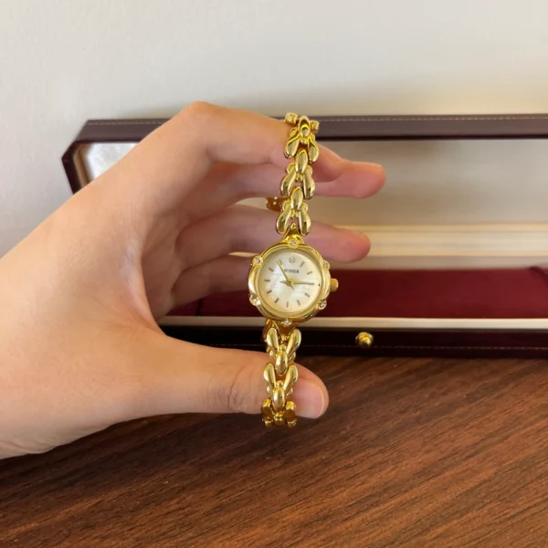 Classic Cream Round Dial Gold Curved Link Bracelet Watch for Women