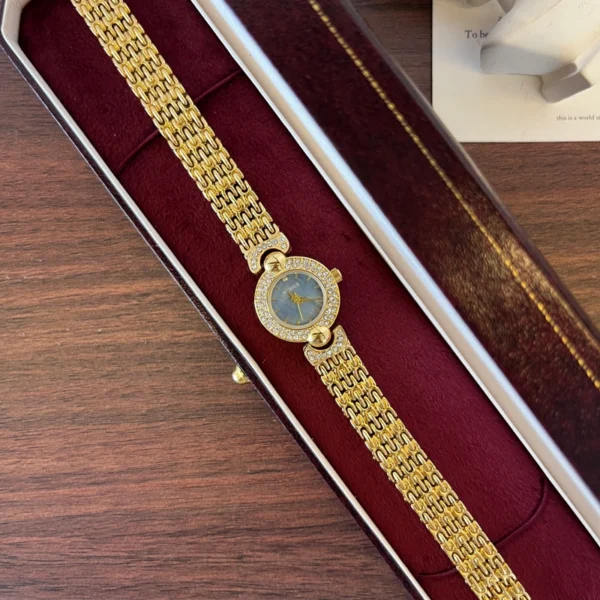 Elegant Blue Round Dial Gold Textured Bracelet Watch for Women