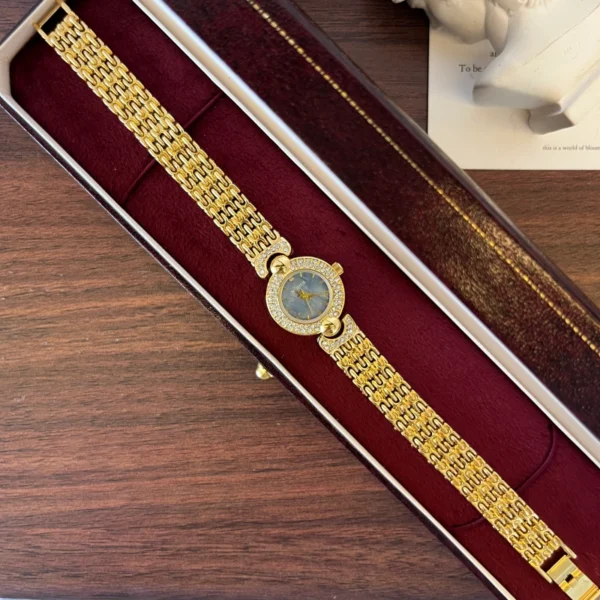 Elegant Blue Round Dial Gold Textured Bracelet Watch for Women