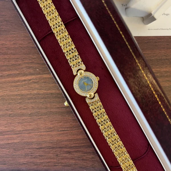 Elegant Blue Round Dial Gold Textured Bracelet Watch for Women