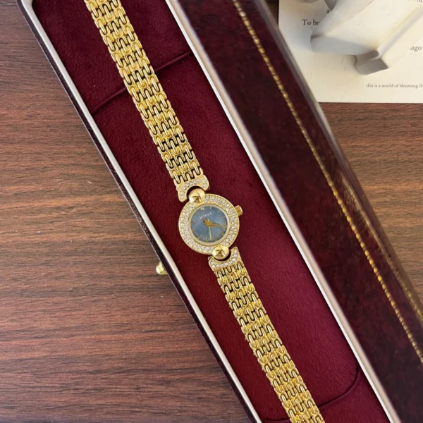 Elegant Blue Round Dial Gold Textured Bracelet Watch for Women