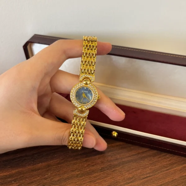 Elegant Blue Round Dial Gold Textured Bracelet Watch for Women