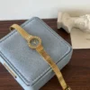 Elegant Blue Round Dial Gold Decorative Bracelet Watch for Women