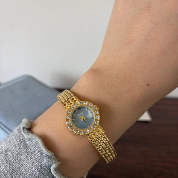 Elegant Blue Round Dial Gold Decorative Bracelet Watch for Women