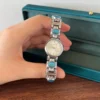 Elegant Blue Accent Round Dial Silver Bracelet Watch for Women