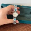 Elegant Blue Accent Round Dial Silver Bracelet Watch for Women