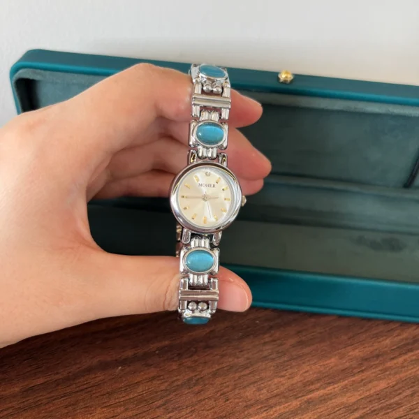 Elegant Blue Accent Round Dial Silver Bracelet Watch for Women