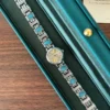 Elegant Blue Accent Round Dial Silver Bracelet Watch for Women