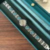 Elegant Blue Accent Round Dial Silver Bracelet Watch for Women