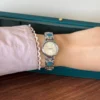 Elegant Blue Accent Round Dial Silver Bracelet Watch for Women