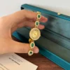 Elegant Green Oval Accent Gold Bracelet Watch for Women