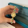 Elegant Green Oval Accent Gold Bracelet Watch for Women