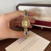 Elegant Blue Oval Accent Gold Oval Dial Bracelet Watch for Women