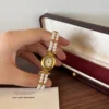 Elegant White Double Row Bead Gold Round Dial Watch for Women