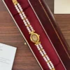 Elegant White Double Row Bead Gold Round Dial Watch for Women