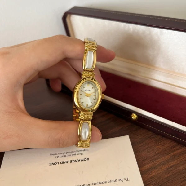 Elegant Pale Rectangle Accent Gold Oval Dial Watch for Women