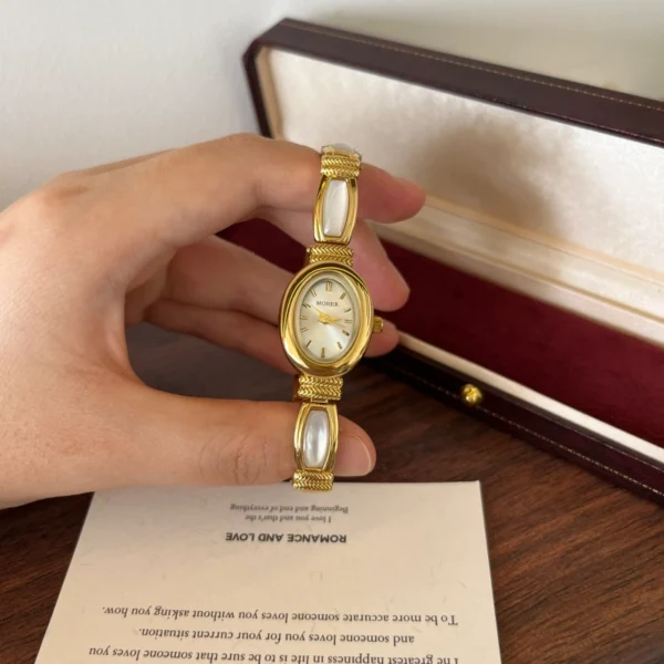 Elegant Pale Rectangle Accent Gold Oval Dial Watch for Women