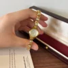 Elegant Gold Round Dial Slim Decorative Bracelet Watch for Women