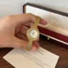 Elegant Gold Sunburst Round Dial Slim Bracelet Watch for Women