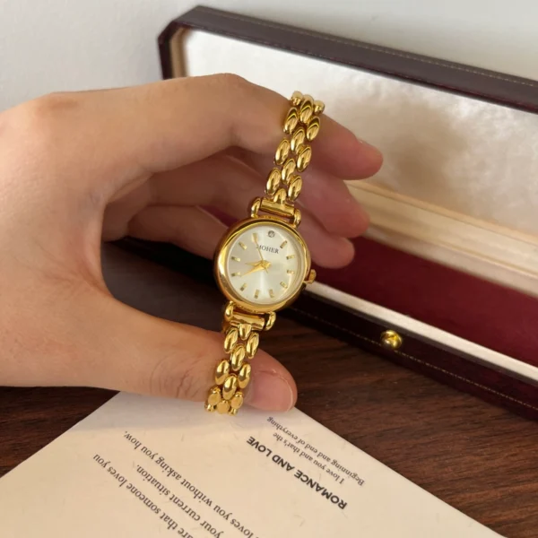 Classic Pale Round Dial Gold Double Chain Bracelet Watch for Women