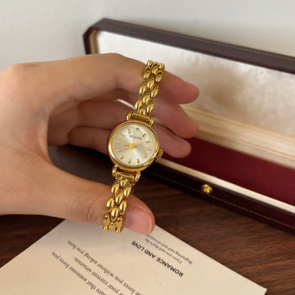 Classic Pale Round Dial Gold Double Chain Bracelet Watch for Women
