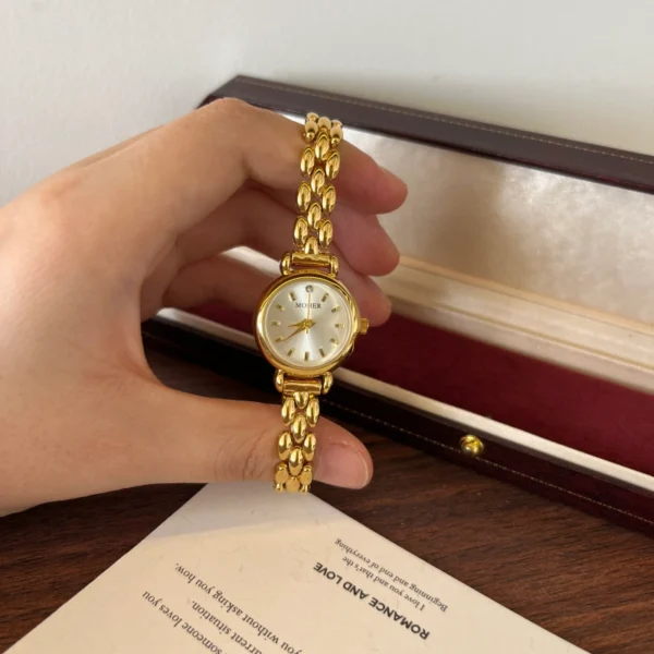 Classic Pale Round Dial Gold Double Chain Bracelet Watch for Women