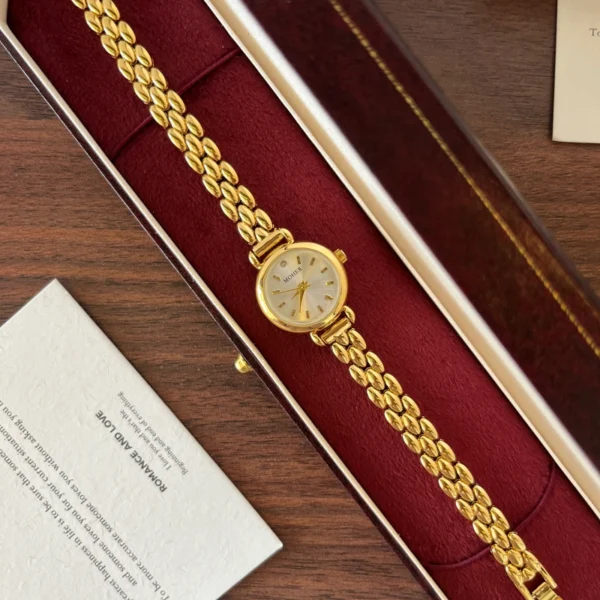 Classic Pale Round Dial Gold Double Chain Bracelet Watch for Women