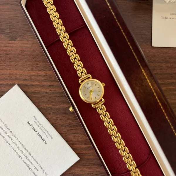 Classic Pale Round Dial Gold Double Chain Bracelet Watch for Women