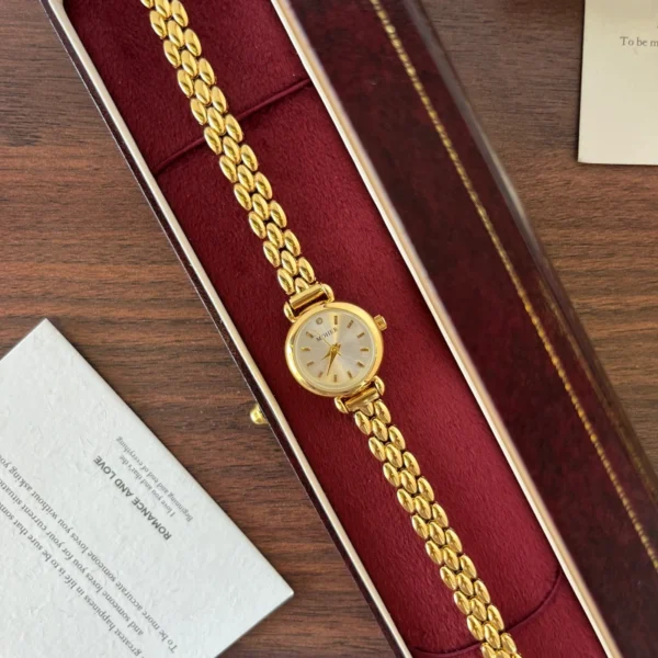 Classic Pale Round Dial Gold Double Chain Bracelet Watch for Women