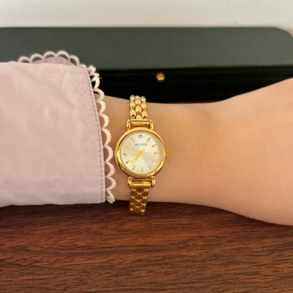 Classic Pale Round Dial Gold Double Chain Bracelet Watch for Women