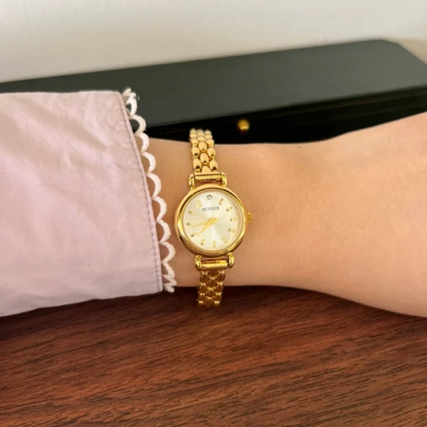 Classic Pale Round Dial Gold Double Chain Bracelet Watch for Women