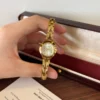 Classic Gold Round Dial Slim Patterned Bracelet Watch for Women